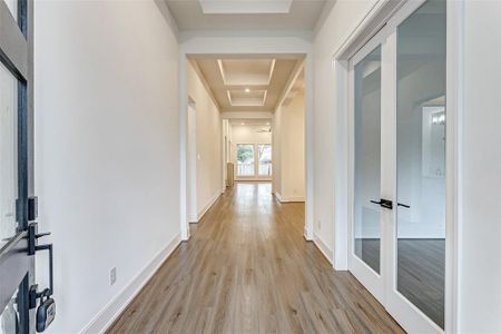 WELCOME HOME! Step inside and you will fall in love! The front foyer features hardwood floors, designer paint, tall ceilings, and an ample amount of natural light.