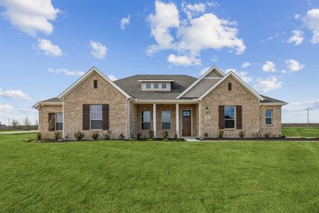 Craftsman-style home with a front yard