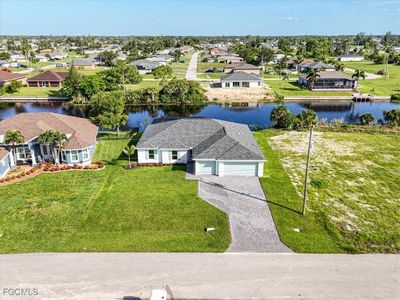 New construction Single-Family house 1258 Ne 40Th St, Cape Coral, FL 33909 plan The Paradise Cove - image