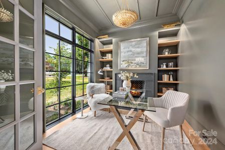 Library/study with fireplace and built ins