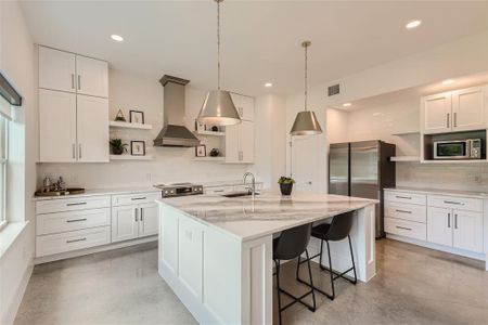 Kitchen is gorgeous with plenty of storage. Including walk-in pantry!