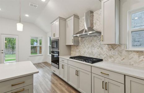 Spacious kitchen with premium appliances *real home pictured