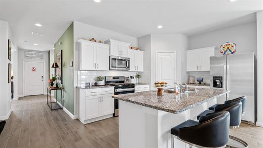 Kitchen - All Home and community information, including pricing, included features, terms, availability and amenities, are subject to change at any time without notice or obligation. All Drawings, pictures, photographs, video, square footages, floor plans, elevations, features, colors and sizes are approximate for illustration purposes only and will vary from the homes as built.