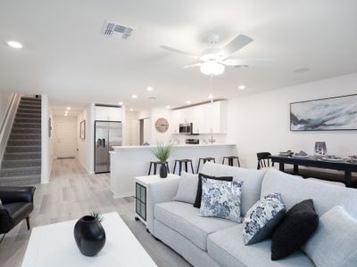 Enjoy a bright and open living area - Azalea townhome by Highland Homes