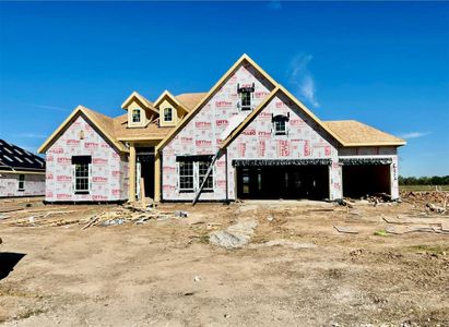 One-story home with 4 bedrooms, 3 baths and 4-car tandem garage