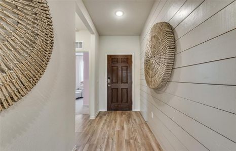 Welcoming and bright entry way into home *Real Home pictured, former model.