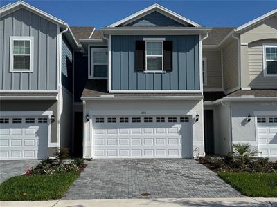 New construction Townhouse house 1293 Stockwell Avenue, Saint Cloud, FL 34771 - photo 0