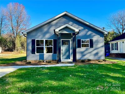 New construction Single-Family house 213 Seigle Street, Lowell, NC 28098 - photo 0