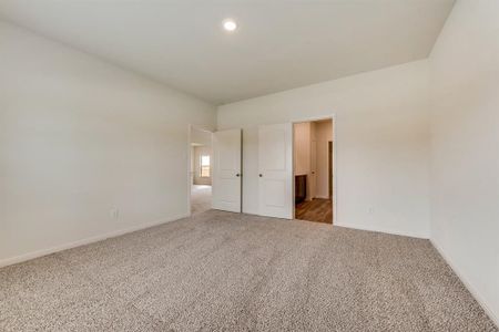 Unfurnished bedroom featuring carpet