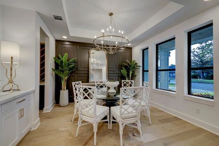 Formal dining room with accent wall*photos are of a previously constructed home by the builder. 1406 Thornton may have different selections at builders sole discretion. These photos are not meant to be an exact representation of 1406 Thornton.