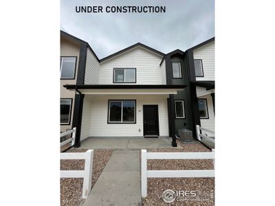 New construction Townhouse house 3709 Sequoia Ct, Evans, CO 80620 - photo 0