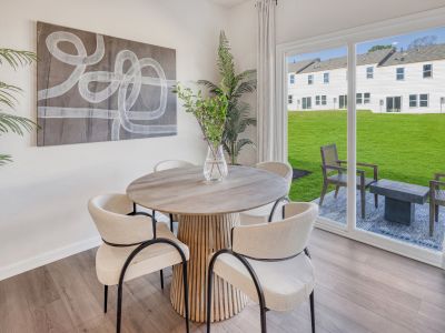 Dining area in the Topaz floorplan at a Meritage Homes community in Graham, NC.