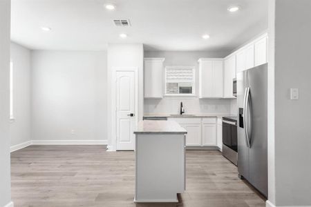 Dining area and kitchen.