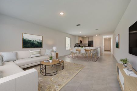 Living room featuring light tile patterned floors