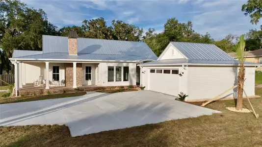 This two car oversized garage will hold today's larger vehicles in addition to the extra long and wide driveway.