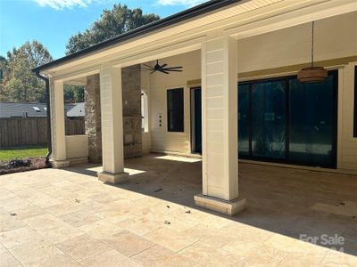 Huge Outdoor Living with travertine