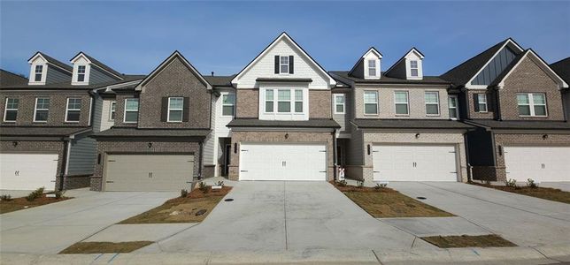 New construction Townhouse house 2777 Lou Lou Lane, Buford, GA 30519 - photo 0