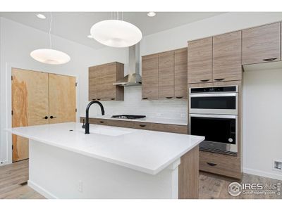 Modern Kitchen with large island & pantry