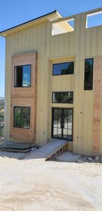 Front entry with roof top deck.