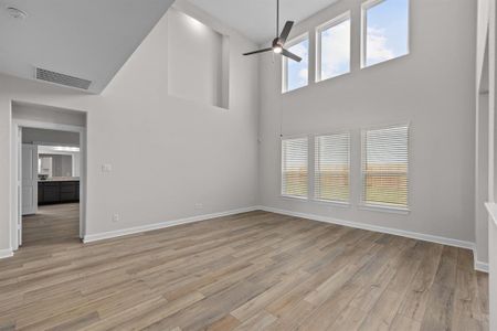 The living room is large enough for an oversized sectional couch.