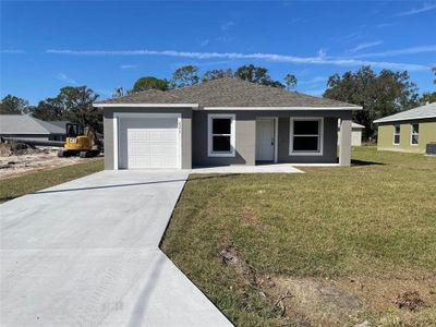 New construction Single-Family house 2373 Taylor Road E, Auburndale, FL 33823 - photo 0