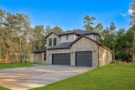 New construction Single-Family house 855 County Road 6324, Dayton, TX 77535 JAXON- photo 1 1