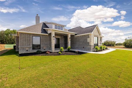 View of front of home with a front yard