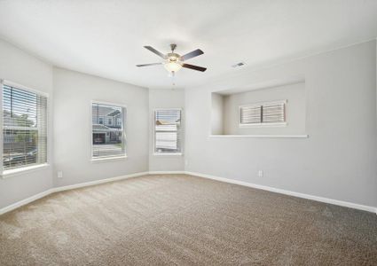 Downstairs master bedroom with bay windows.