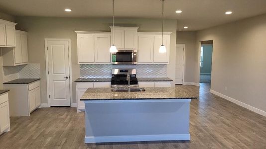 Kitchen - All Home and community information, including pricing, included features, terms, availability and amenities, are subject to change at any time without notice or obligation. All Drawings, pictures, photographs, video, square footages, floor plans, elevations, features, colors and sizes are approximate for illustration purposes only and will vary from the homes as built.