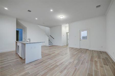 10 ft ceilings are decorated with crown molding throughout the 1st floor and set the tone for what to expect in the rest of the home.