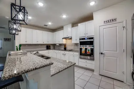 New construction Single-Family house 15323 Danae Bnd, San Antonio, TX 78245 null- photo 4 4