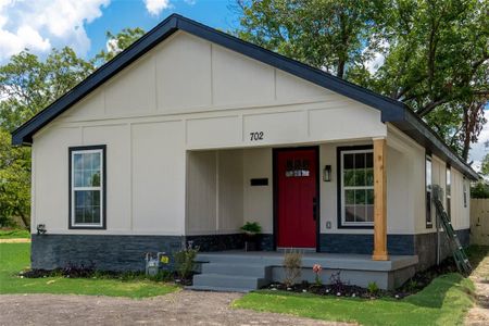 View of front of home featuring covered porch