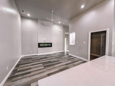 Living room with decorative fireplace