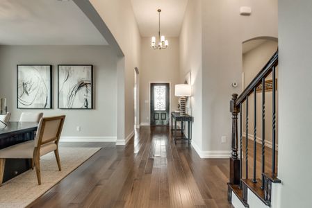 Welcoming entryway with two-story ceilings