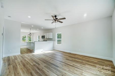 Open Layout of Living Room & Kitchen