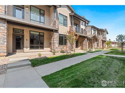 Covered front patio of first floor unit