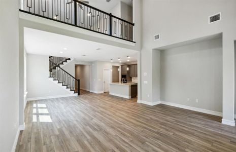 Two-story gathering room *real home pictured