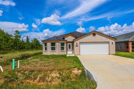 New construction Single-Family house 196 County Road 5102 L, Cleveland, TX 77327 - photo 0