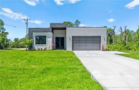New construction Single-Family house 710 Eisenhower Blvd, Lehigh Acres, FL 33974 - image