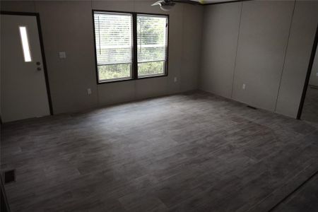 Spare room with hardwood / wood-style flooring