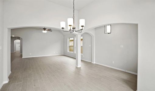 View of dining room and great room (*Photo not of actual home and used for illustration purposes only.)