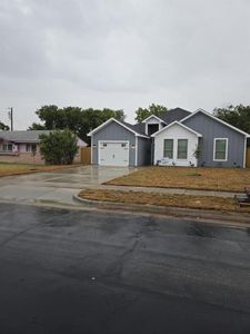 Ranch-style home with a garage