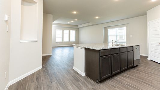 Kitchen to Dining Area and Family Room