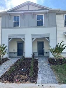 New construction Townhouse house 1285 Blue Island Drive, Clermont, FL 34714 - photo 0