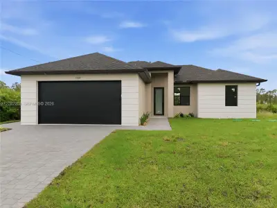 New construction Single-Family house 1222 Earnest St E, Lehigh Acres, FL 33974 - image