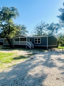 New construction Single-Family house 125 Wood Farm Estates Road, Huntsville, TX 77320 - photo 0