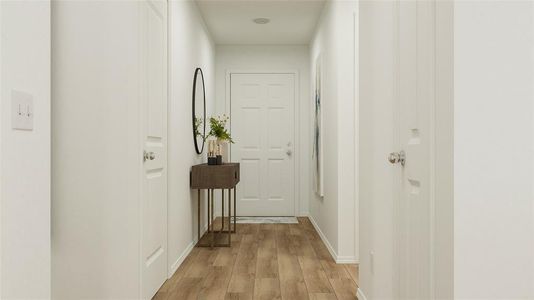 Corridor featuring light hardwood / wood-style floors