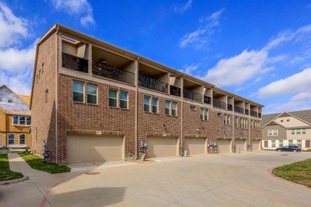 Newly constructed Townhouse end unit with third floor balcony and single door two car garage - View