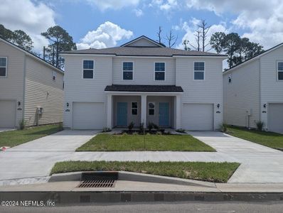 New construction Townhouse house 14528 Macadamia Lane, Jacksonville, FL 32218 - photo 0