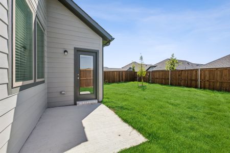 Patio in the Cedar home plan by Trophy Signature Homes – REPRESENTATIVE PHOTO